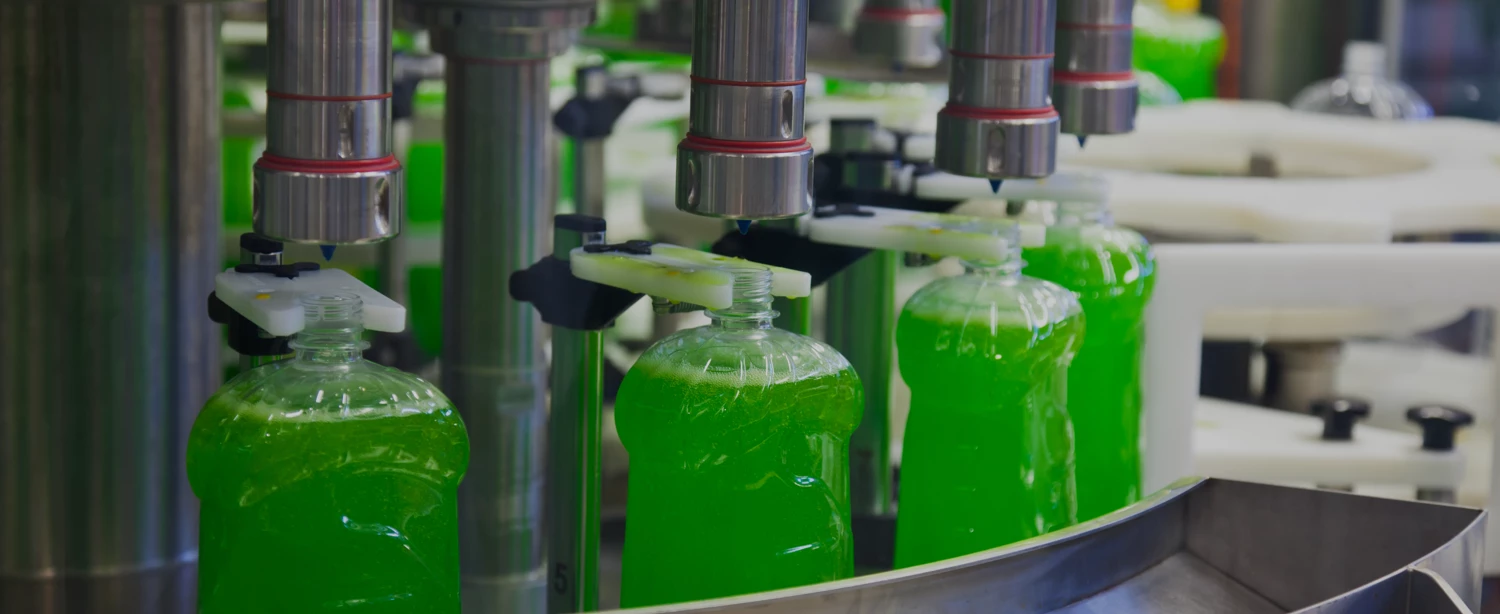 filling bottles on assembly line